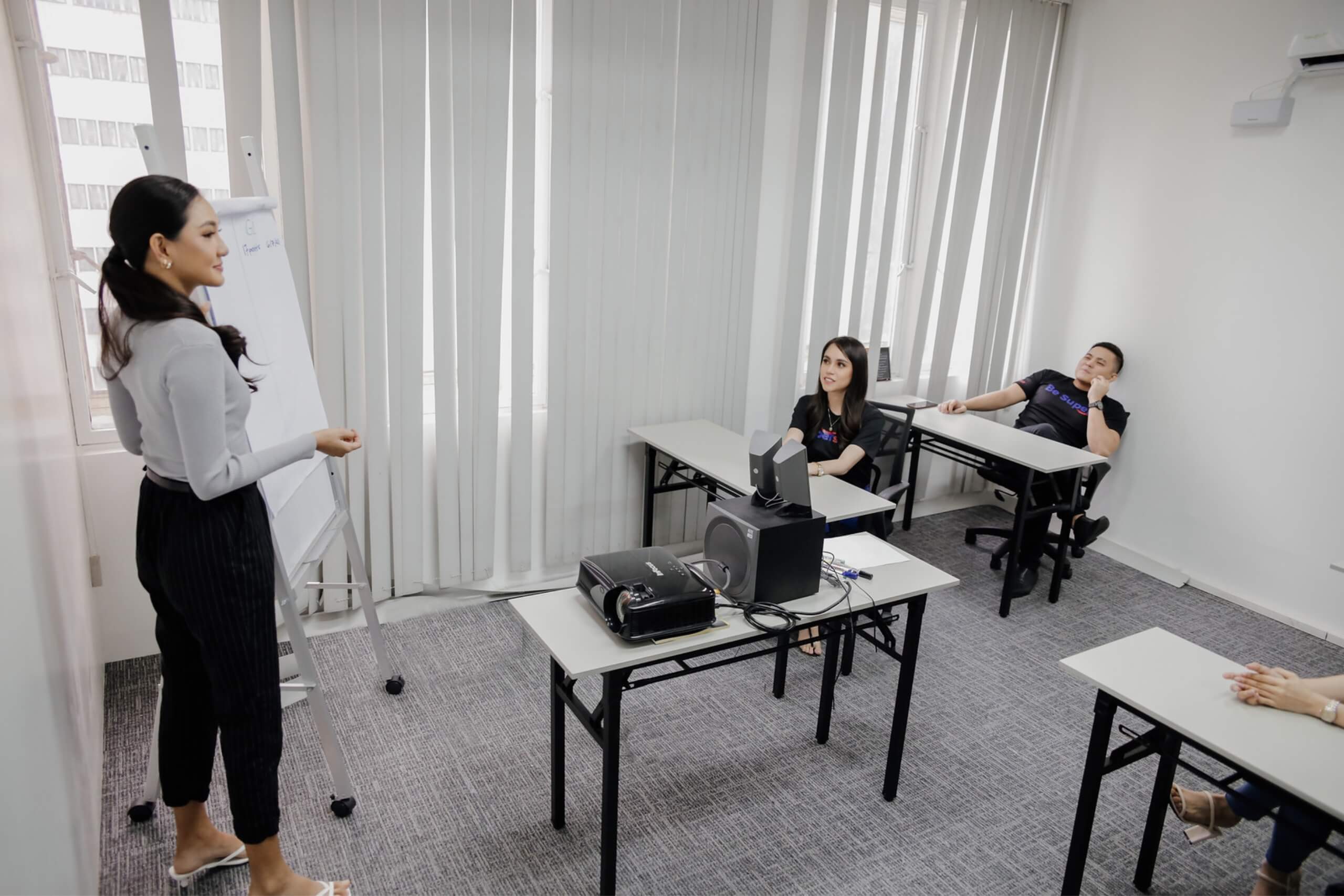 benefit from outsourcing Woman discussing in front