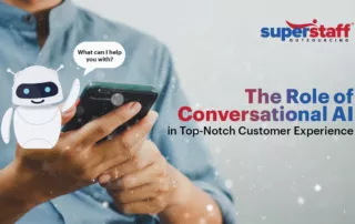 A man enjoys using his smartphone because of its conversational AI chatbot.