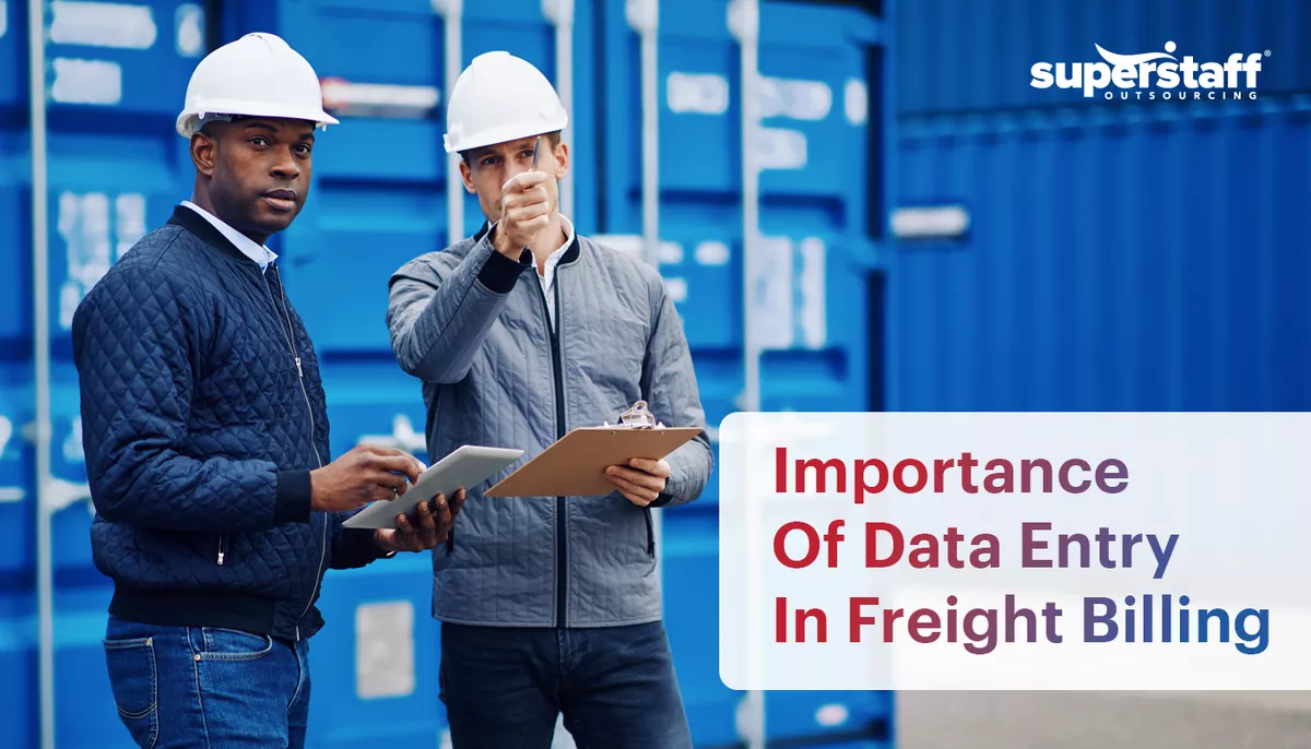 Importance-Of-Data-Entry-In-Freight-Billing The image shows two male freight workers discussing something in their workplace. It also shows the text "Precision Matters: The Vital Role of Accurate Data Entry in Freight Billing."