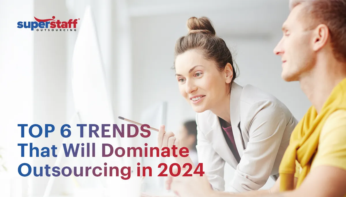 Top-6-Trends-That-Will-Dominate–Outsourcing-in-2024 2 professionals are working on a desktop. Image caption says: Outsourcing trends that will dominate 2024.