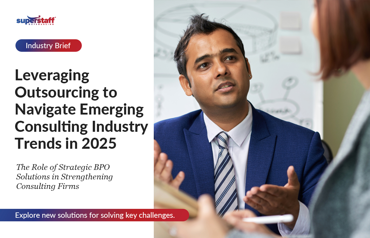 Leveraging-Outsourcing-to-Navigate-Emerging-Consulting-Industry-Trends-in-2025_Featured The image features a professional setting with a man in a formal blue suit and tie actively engaged in a discussion. The headline reads, "Leveraging Outsourcing to Navigate Emerging Consulting Industry Trends in 2025," with a subheading, "The Role of Strategic BPO Solutions in Strengthening Consulting Firms."