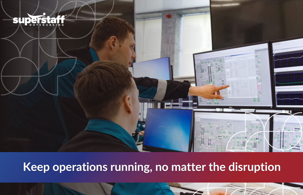 Office staff working to reflect business continuity message.