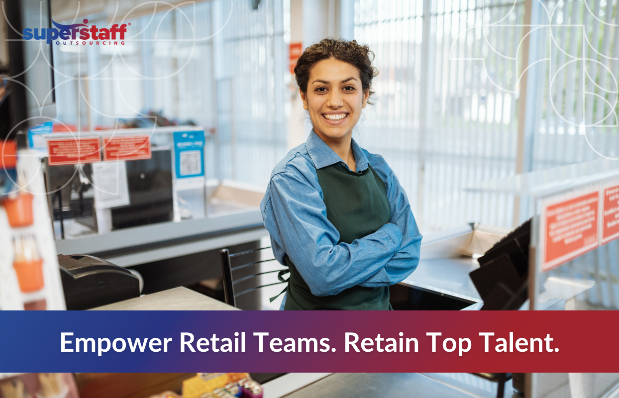 Smiling retail worker standing confidently behind a checkout counter, symbolizing the importance of empowering teams and boosting retail workforce retention in a competitive job market.