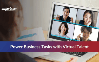 Team meeting on a laptop showcasing diverse individuals collaborating virtually for business tasks.