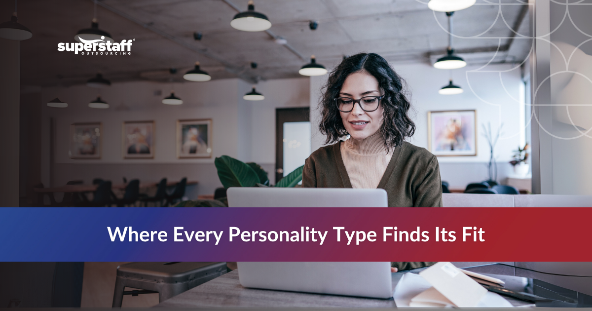 Young woman typing in a call center work environment.