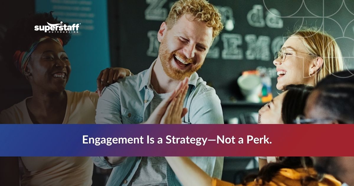Silent Signals Your Employees_Featured Smiling office workers sharing a light moment, contrasting with common causes of employee disengagement in the workplace