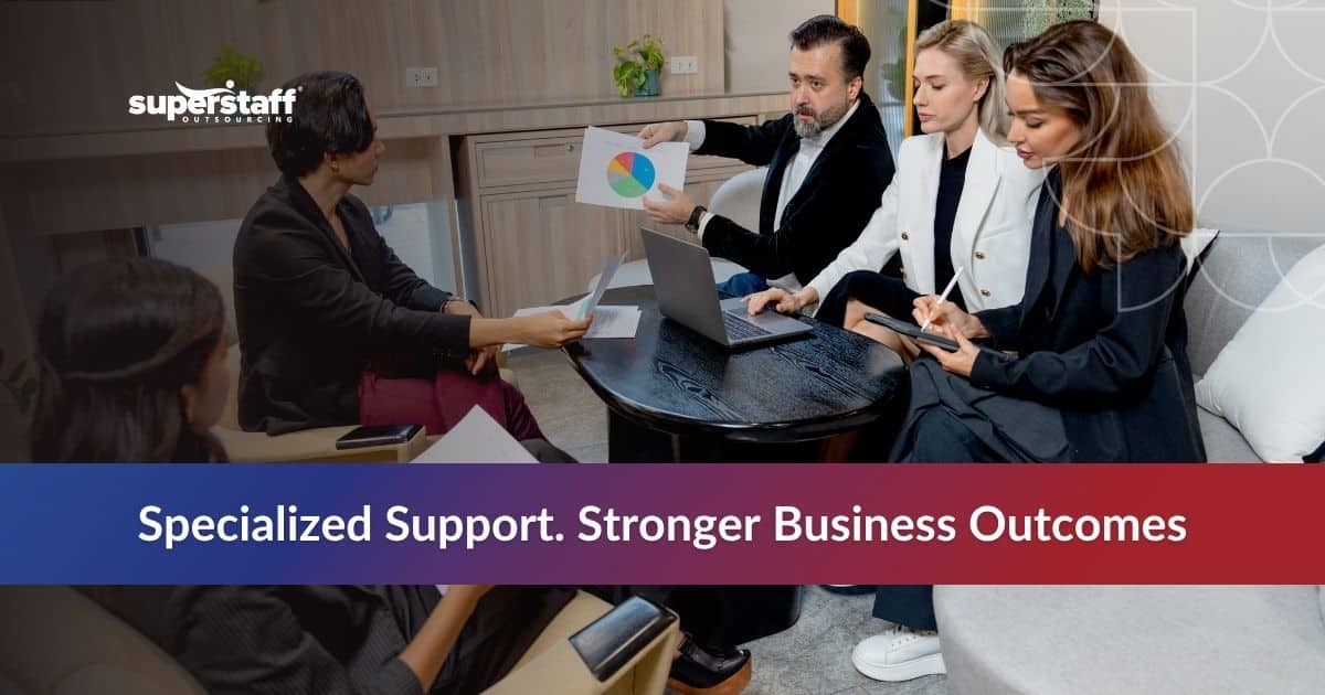 Business team collaborating on industry-specific solutions during a meeting in a modern office space.