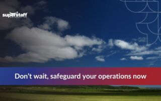 Scenic view of clouds over a green landscape with text urging businesses to safeguard their operations.