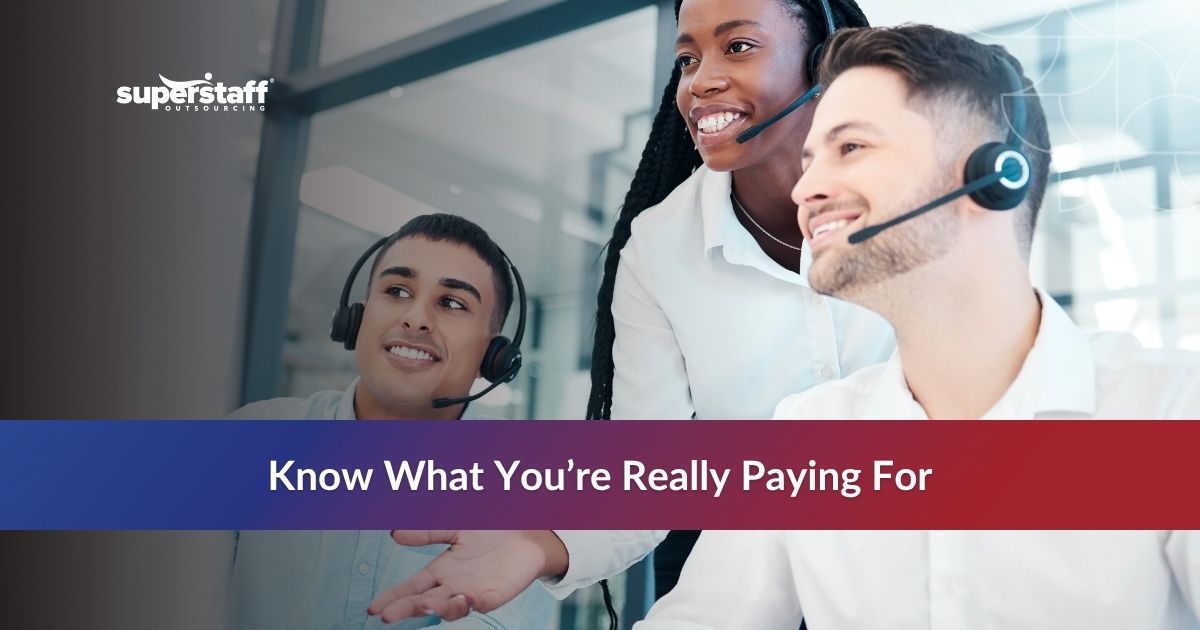 Call center agents collaborating together in a Philippine BPO office, highlighting the real outsource customer service cost.