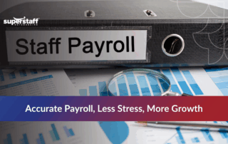 business owner reviewing payroll processing services benefits