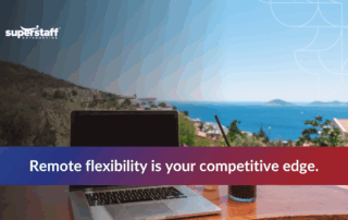 Laptop on a table with a scenic ocean view, emphasizing remote work flexibility for BPO success.