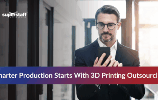 Employee reviewing designs on phone related to 3D printing outsourcing