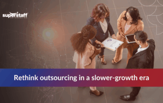 Business professionals discussing strategies as global Business Process Management slowdown influences priorities.