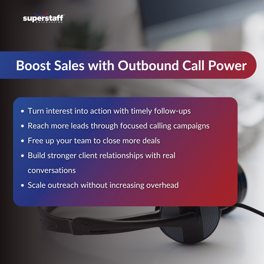 Smiling male agent taking a call at an outgoing call center 