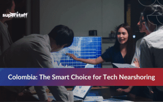 Colombian agents collaborating in an office, showcasing nearshore Colombia services