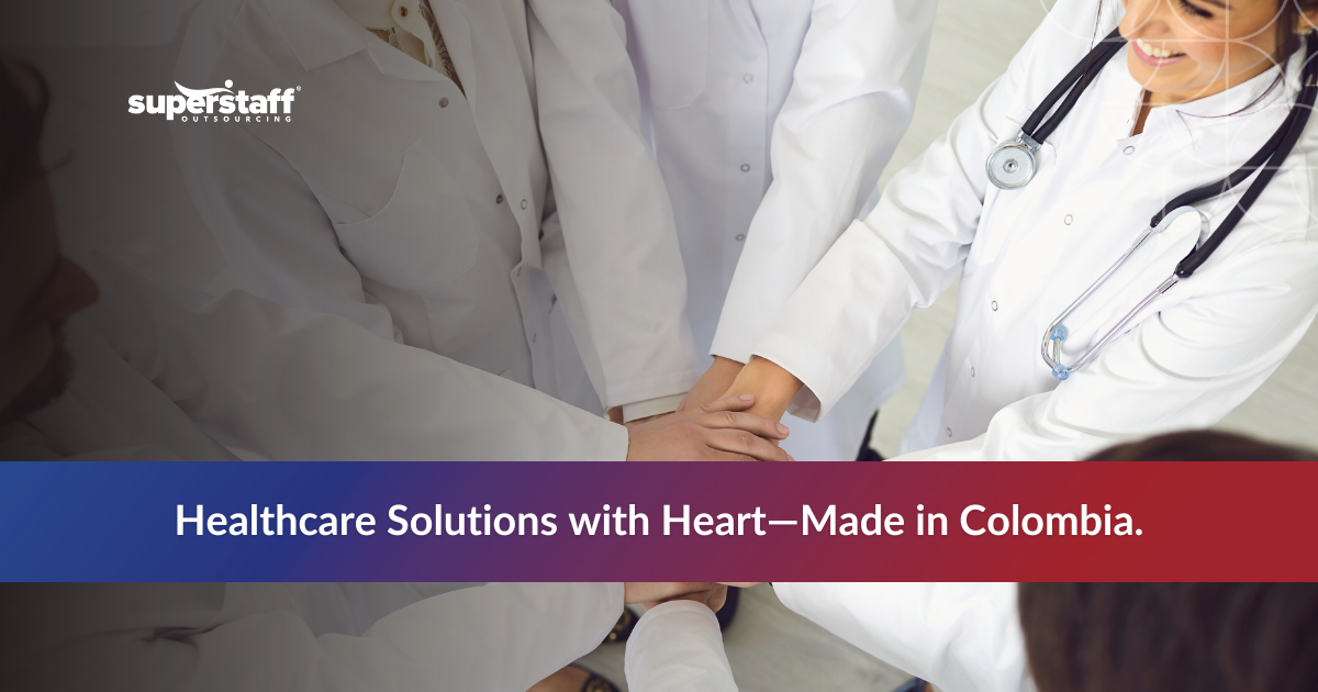 Healthcare workers putting hands together to represent teamwork in outsourced healthcare services.