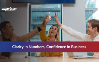 Professional working on laptop with financial charts reviewing remote accountant services for business