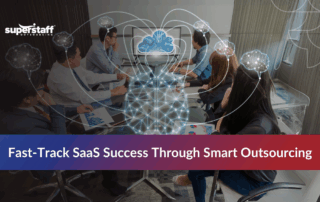 BPO workers brainstorming together in an office, representing outsourcing SaaS development services.