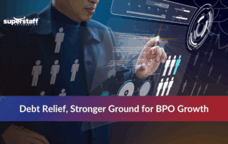 Hand pointing at a digital screen with figures, symbolizing Colombia national debt and economic data.