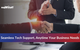 Two business professionals shaking hands with a busy office background illustrating the best tech support outsourcing partnership.