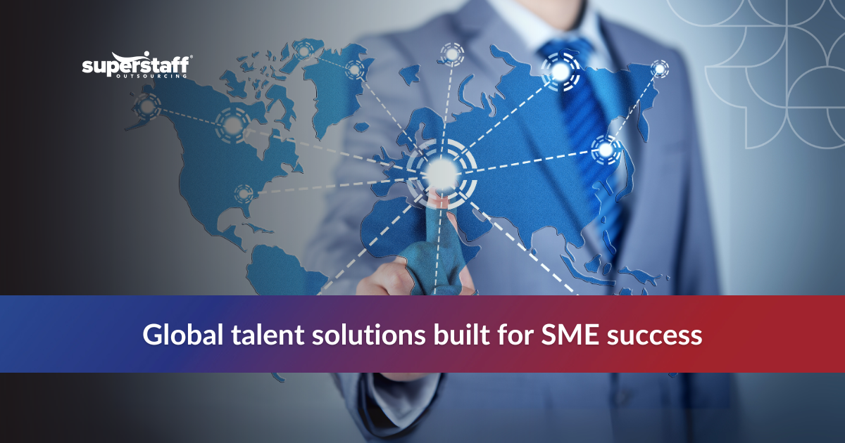 Business professionals shaking hands at a meeting table promoting offshore staffing services to boost SME growth and efficiency.