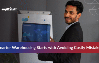 Man working with graphs representing outsourcing warehouse functions and supply chain performance