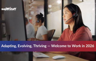 Team collaborating in a modern office representing the future of work 2026 with AI and hybrid models