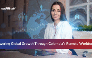 Team working under remote workforce Colombia guidelines in a modern office setup