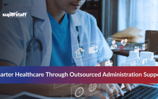 Healthcare professionals discussing the benefits of outsourcing in healthcare administration