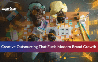 Data professionals collaborating on analytics demonstrating benefits of data science outsourcing services